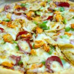 Vegetarian and chicken pizza | 1220hslsdf