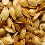 Delicious Oven-Roasted Pumpkin Seeds - She Started From Scratch
