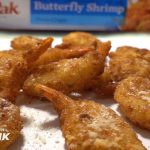 Best answer: How do you air fry frozen breaded butterfly shrimp?