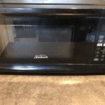 How do I set the clock on this Sunbeam 0.7 cu ft 700 Watt Microwave Oven -  Black - SGCMV807BK-07 ? The question as old as time...: Appliances