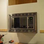 Customizing and hanging the Microwave Cabinet - Loving Here