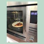 Domino's shares hack for microwaving pizza with cup of water