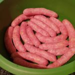 How long do you cook raw sausage in the microwave?