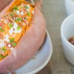 Bacon and feta take this baked sweet potato to the next level – SheKnows