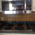 Clearance between gas stove top and microwave above