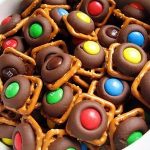 Hey good lookin, whatcha got cookin?: Pretzel, Hershey Kiss, and M&M Bites  | Chocolate treats, Desserts, Pretzel treats