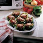 A microwave version of stuffed bell peppers made with ground beef, rice,  egg… | Stuffed peppers, Italian stuffed peppers, Green pepper recipes