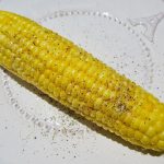 How long does it take to cook two ears of corn in the microwave?